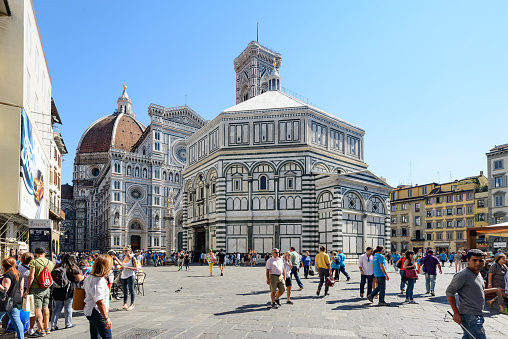 Florence, Italy - September 25, 2016: Tourist in the square in front of Florence Baptistery