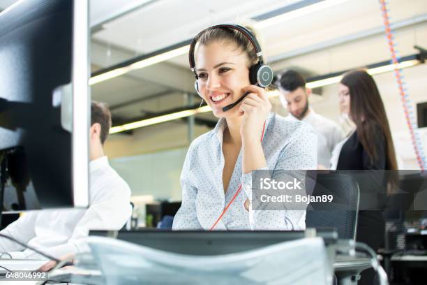 Smiling Agent Woman With Headsets Portrait Of Call Center Worker At Office Stock Photo - Download Image Now