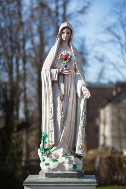 Rezekne, Latvia. The statue of Godmother Fatima next to the Virgin of Anguish Roman Catholic church.