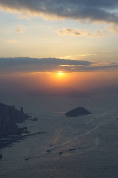 istock Hong Kong Victoria Harbor sunset high angle 648073188