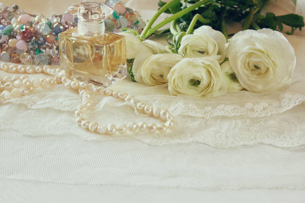istock white delicate lace fabric and flowers 648078540