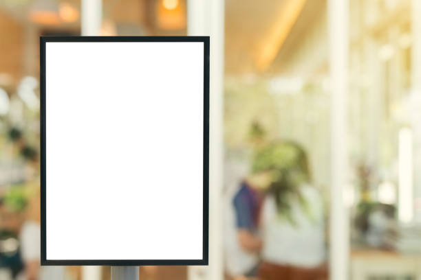 istock Blank mock up of vertical poster billboard sign with copy space for your text message or content in the modern shopping mall. 648081564