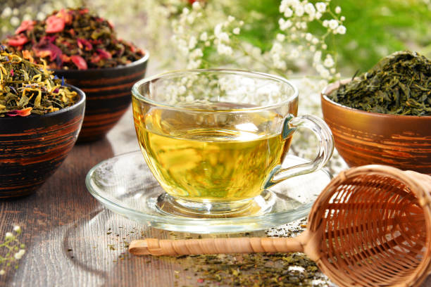 istock Composition with cup of tea and bowls of tea leaves 648085268
