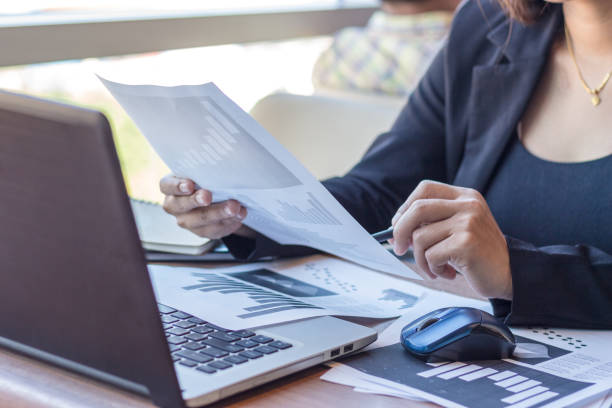 istock Close Up businessmen working at a coffee shop 648095472