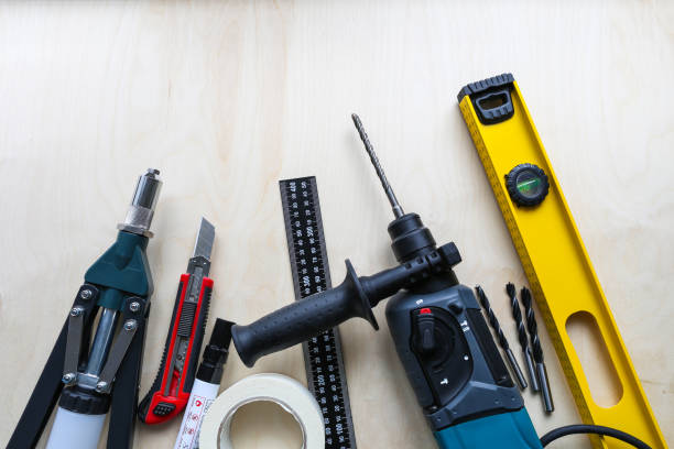 istock Assorted Tools on Plywood Background and Free Space for Text 648099328