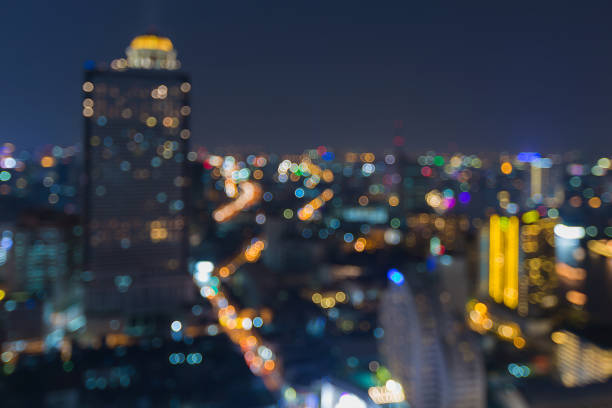 istock Night blurred bokeh light city downtown aerial view 648113134