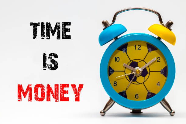 istock Time is Money on a white background. Retro alarm clock 648126384