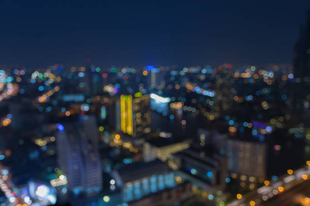 istock Blurred bokeh light night view city downtown 648126502