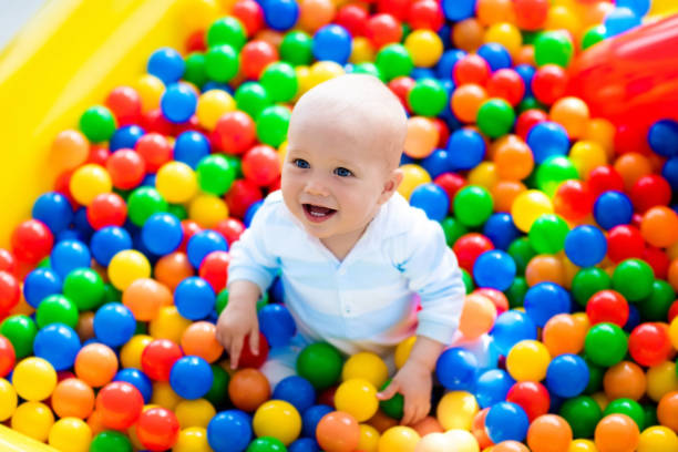 istock Child playing in ball pit on indoor playground 648138692