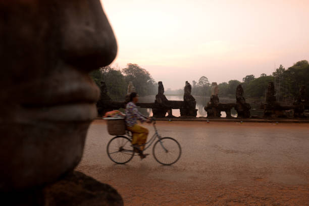 The Bridge at the Angkor Tom Gate in the Temple City of Angkor near the City of Siem Riep in the west of Cambodia.