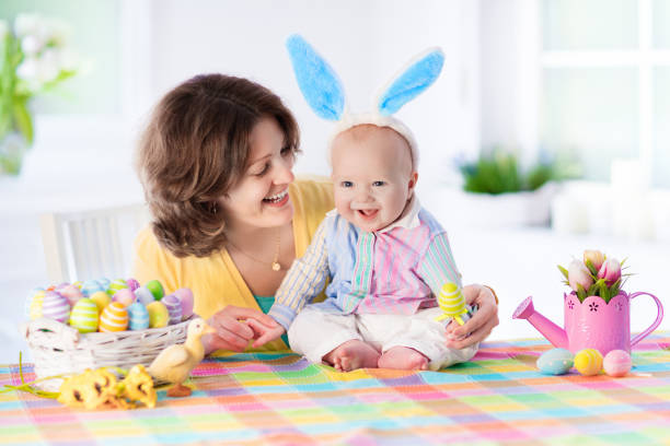 istock Mother and child celebrating Easter at home 648142976