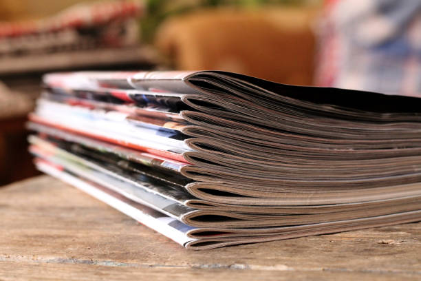 istock Magazines on the wooden table 648145926