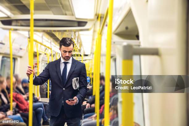 Business On The Go Commuting In The Morning In London Stock Photo - Download Image Now