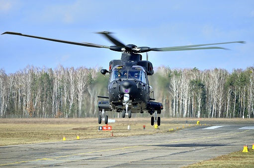 Medium-lift helicopter AW101 Caesar from 15º Stormo Stefano Cagna Aeronautica Militare (Italian Air Forces) approaches to land during demonstration for Polish Army in Warsaw on March 3, 2017.
