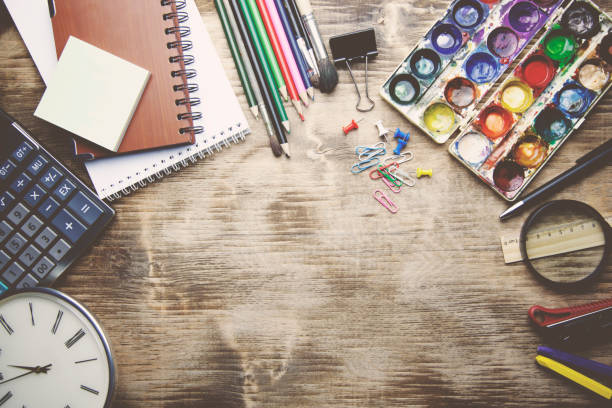istock different stationery on the wooden table 648171924
