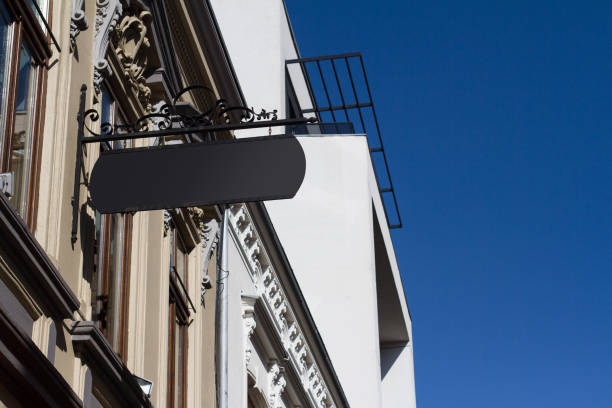 istock square black signboard on a building with classical architecture 648175240