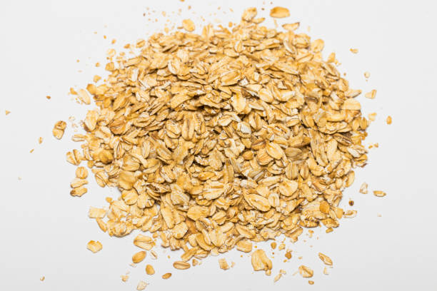istock oatmeal on the white background 648188624