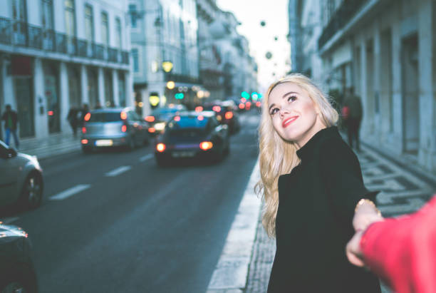 istock Couple Holding hands on the street 648199490