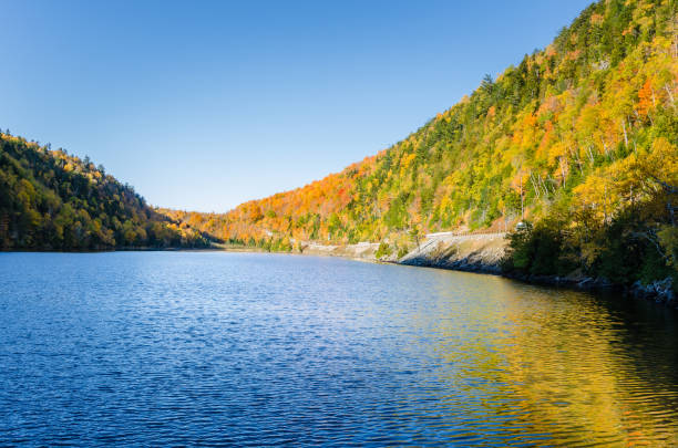 istock Mountain Lake on a Sunny Autumn Day 648215440