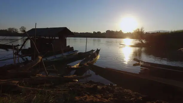 Local boats on the bank of the Mekong River, Laos side