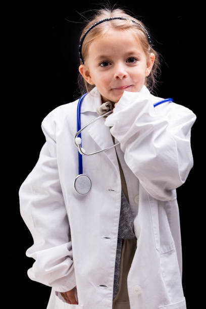 istock Cute little girl playing doctor 648227618