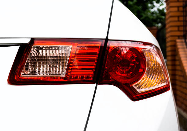 istock Back light taillight of white sport modern car 648233742