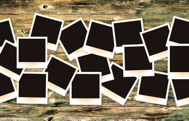 istock Photo frames pack on old painted vintage wooden background 648236306
