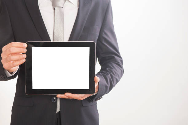 istock Businessman holding blank digital tablet, isolated on white background 648244622
