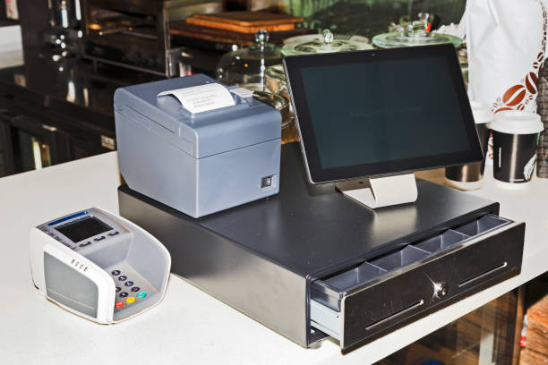 POS Tablet Screen Off Point of sales computer terminal with touch screen tablet, cash register, mobile printer and card payment on a counter at a coffee shop. point of sale tablet stock pictures, royalty-free photos & images