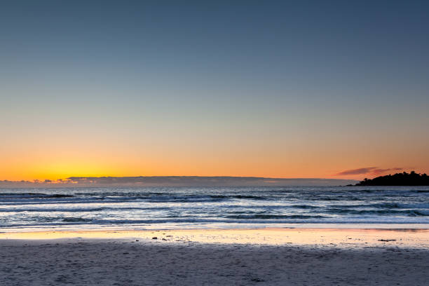 istock Colorful Sunset Over a Desserted Beach 648284164