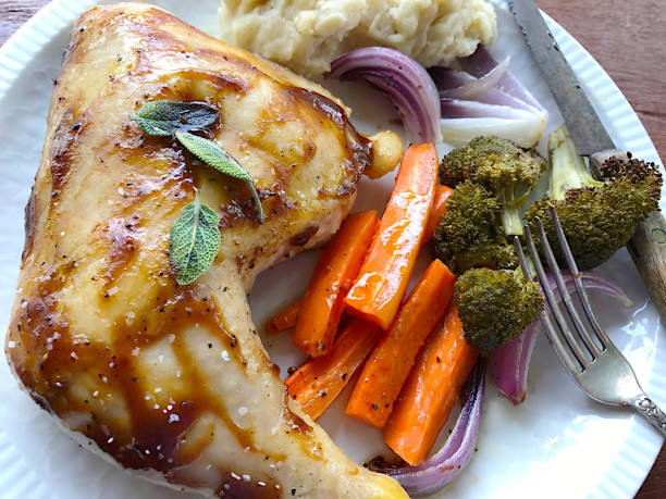 istock Roast chicken with sage and vegetables 648287348