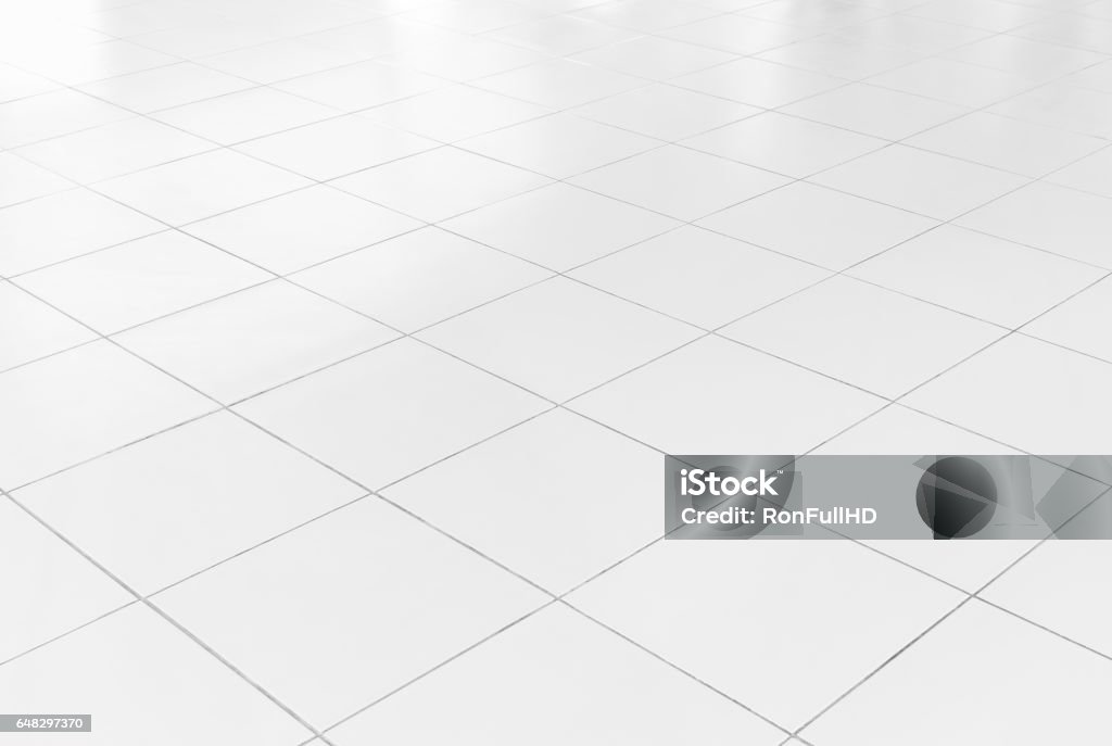 Tile Floor Background White tile floor with geometric line for background. Flooring Stock Photo