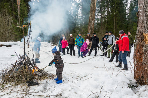 spring festival maslenitsa - the seeing off the russian winter, 13 march 2016. - women jumping bouncing spring imagens e fotografias de stock