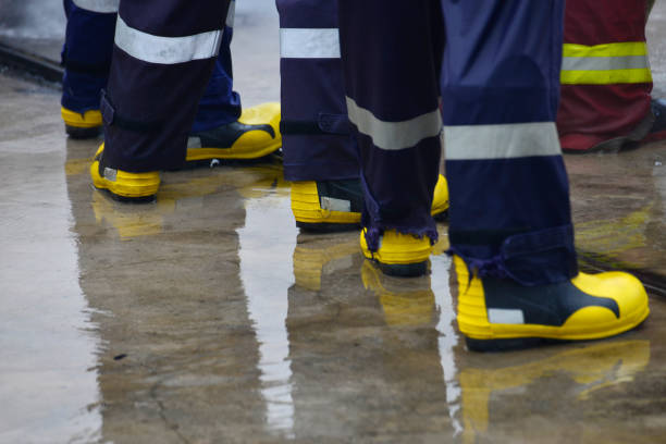istock Close up Fireman footwear in action firefighter. 648311772