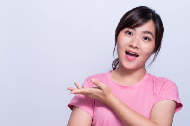 istock Asian woman is happy on isolaed background 648311956