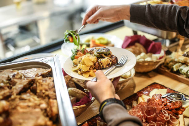 auswahl an speisen  - buffet stock-fotos und bilder