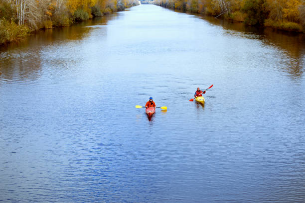 istock Traveling by kayak on the river on a sunny day. 648316324