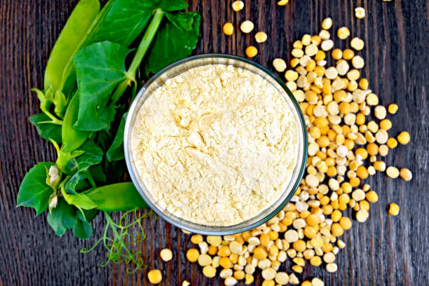 istock Flour pea in glassful on board top 648316418
