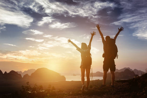 istock Happy couple winner success concept mountains 648318834