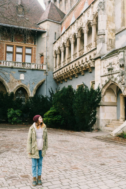 istock Woman walking in Budapest old town 648329400