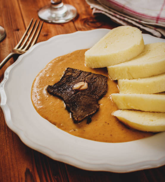 istock Beef tenderloin and sauce 648332446