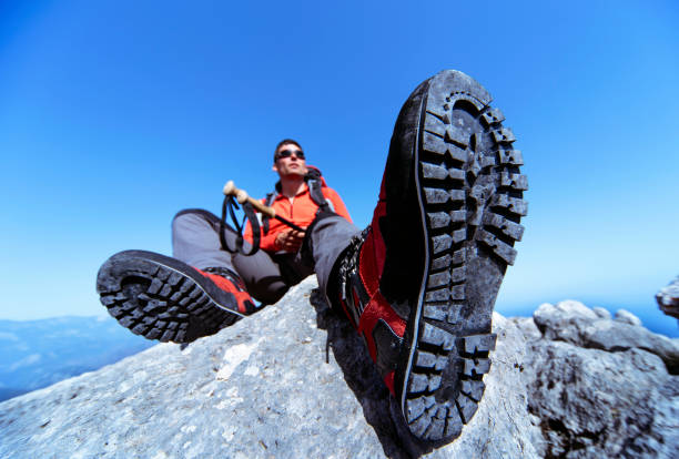 istock A man on foot hike in the mountains. 648332570