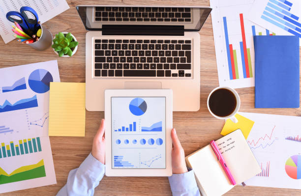 istock Business person and office desk 648337000