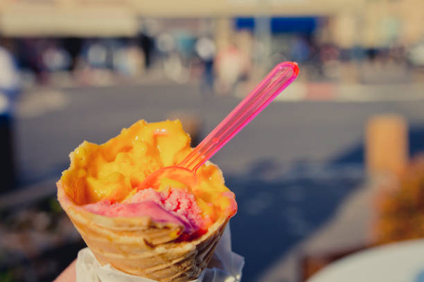istock Holding tropical ice cream cone at summer afternoon moment 648344244