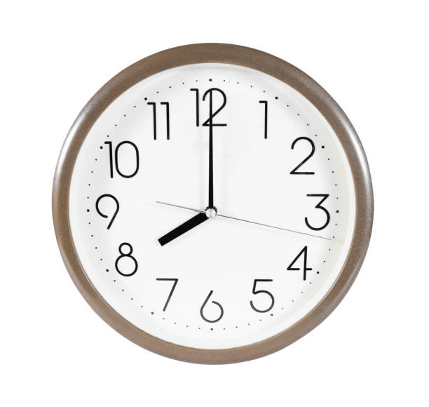 istock Brown wall clock isolated on white background.Wall clock at eight 648345794