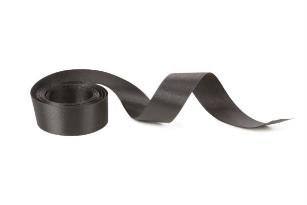istock Black ribbon isolated on white background 648356160