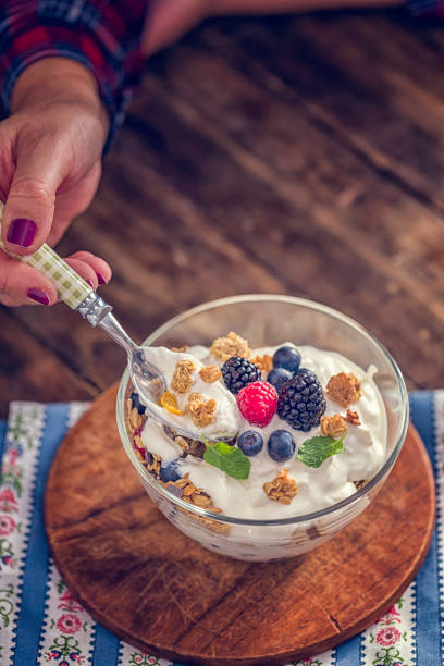 istock Yogurt with Fresh Berries and Cereals 648356432