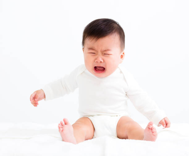 istock Crying baby boy isolated on white 648356460
