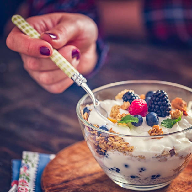 istock Yogurt with Fresh Berries and Cereals 648356564