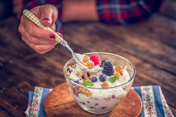 istock Yogurt with Fresh Berries and Cereals 648356588